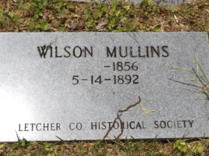 The Letcher County Historical Marker for the Pound Gap Massacre victim Wilson Mullins.  The photograph was taken by Joanna Adams Sergent on location.