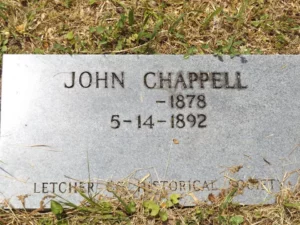 The Letcher County Historical Marker for the Pound Gap Massacre victim John Chappell.  The photograph was taken by Joanna Adams Sergent on location.