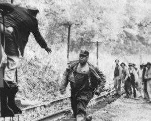 Coal miners catching a train to their homes.   Photographer Unknown