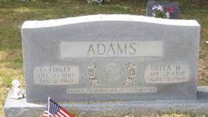 C. Finley Adams and Della Hunsaker Adams.   The photograph was taken by Joanna Adams Sergent at the Laurel Branch Cemetery.