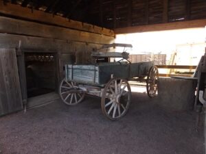 Photograph of one of the buggies in the Bumpass Livestock Barn was taken by Joanna Adams Sergent on March 20, 2022, Discovery Park of America, Heritage Park, Union City, Tennessee.