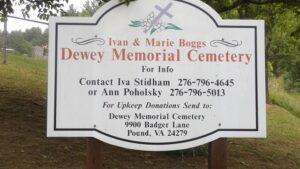 The Ivan and Marie Boggs Dewey Memorial Cemetery entrance sign.   The photograph was taken by Joanna Adams Sergent